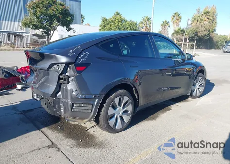 2022 Tesla Model Y Long Range Dual Motor All-Wheel Drive z USA, uszkodzony, nr VIN 7SAYGDEE9NF337966